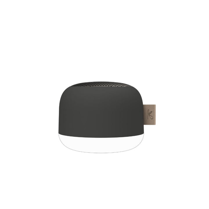 Minimalist waterproof speaker blending into modern bathroom tile decor
