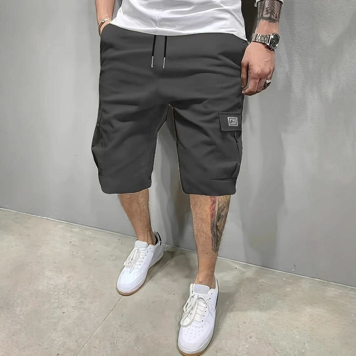 Mens modern relaxed style utility shorts in classic khaki color