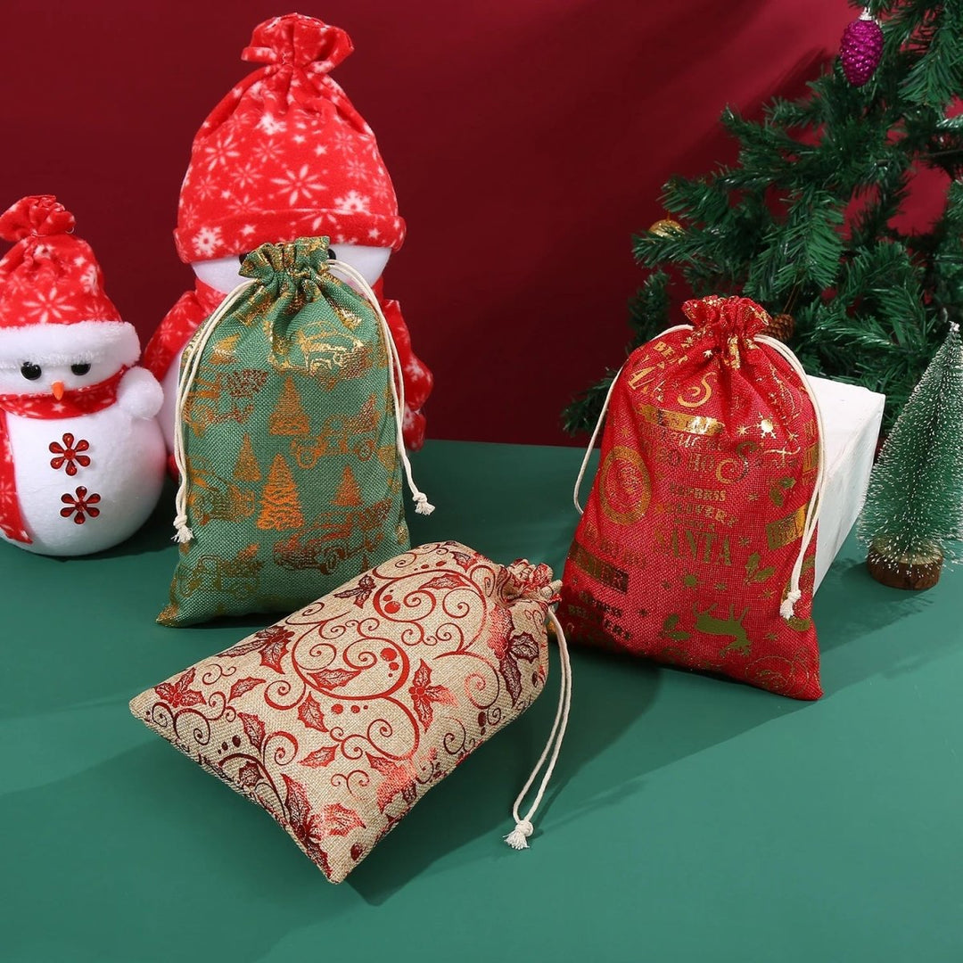 Collection of various sizes of reusable Christmas gift bags ready for holiday use