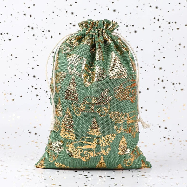 Green tree print holiday gift bag with gold foil details