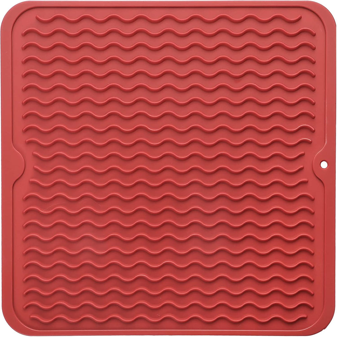 Textured surface of silicone drying mat promoting airflow for drying
