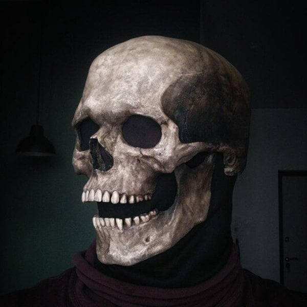 Front angle view of the detailed full-head skull mask with open mouth design