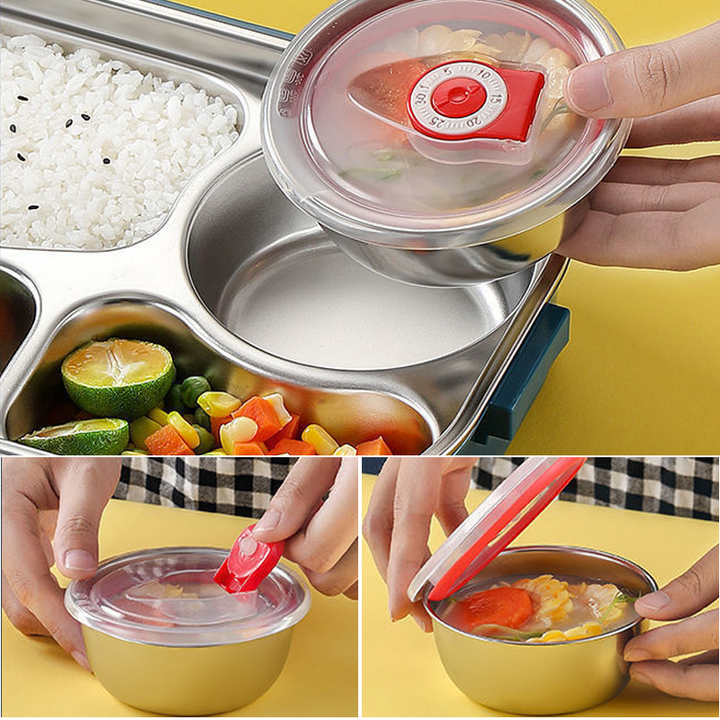 Hands opening a sealed stainless steel soup bowl component from the lunch box