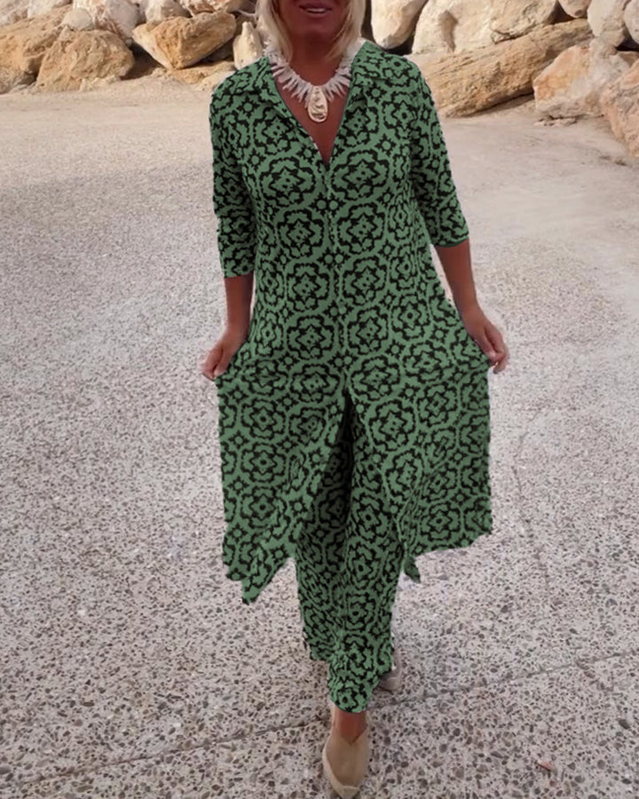 Side profile of women wearing printed travel outfit with wide-leg trousers