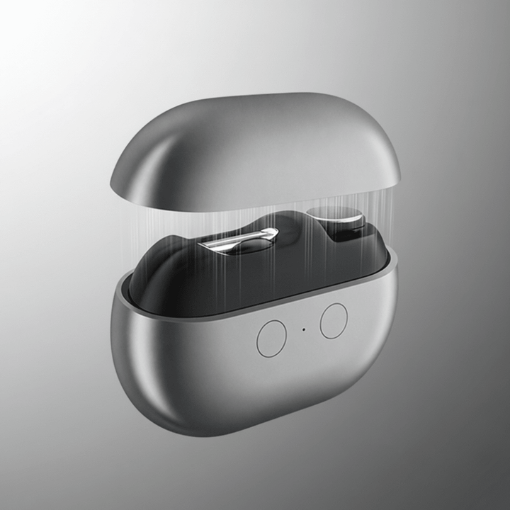Electric nail clipper opened showing internal mechanical structure in gray finish