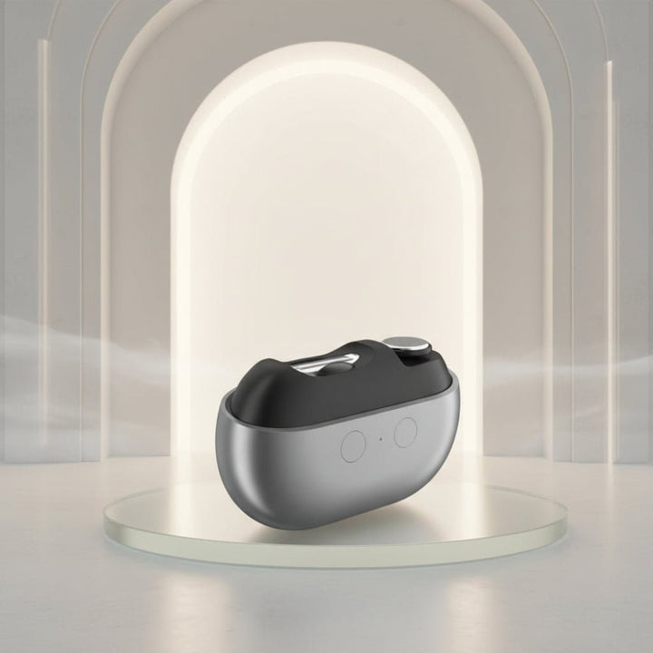 Sleek electric nail clipper displayed on a minimalist lighted podium
