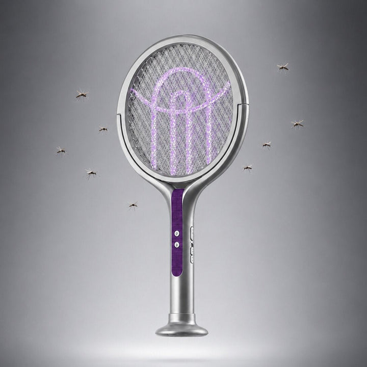 Silver telescopic electric mosquito zapper racket with attracted flying insects