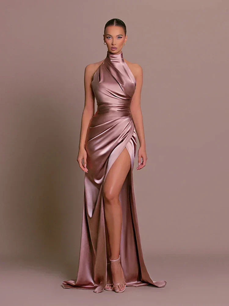 Detailed shot of the waist and draping on a chic women's formal maxi dress