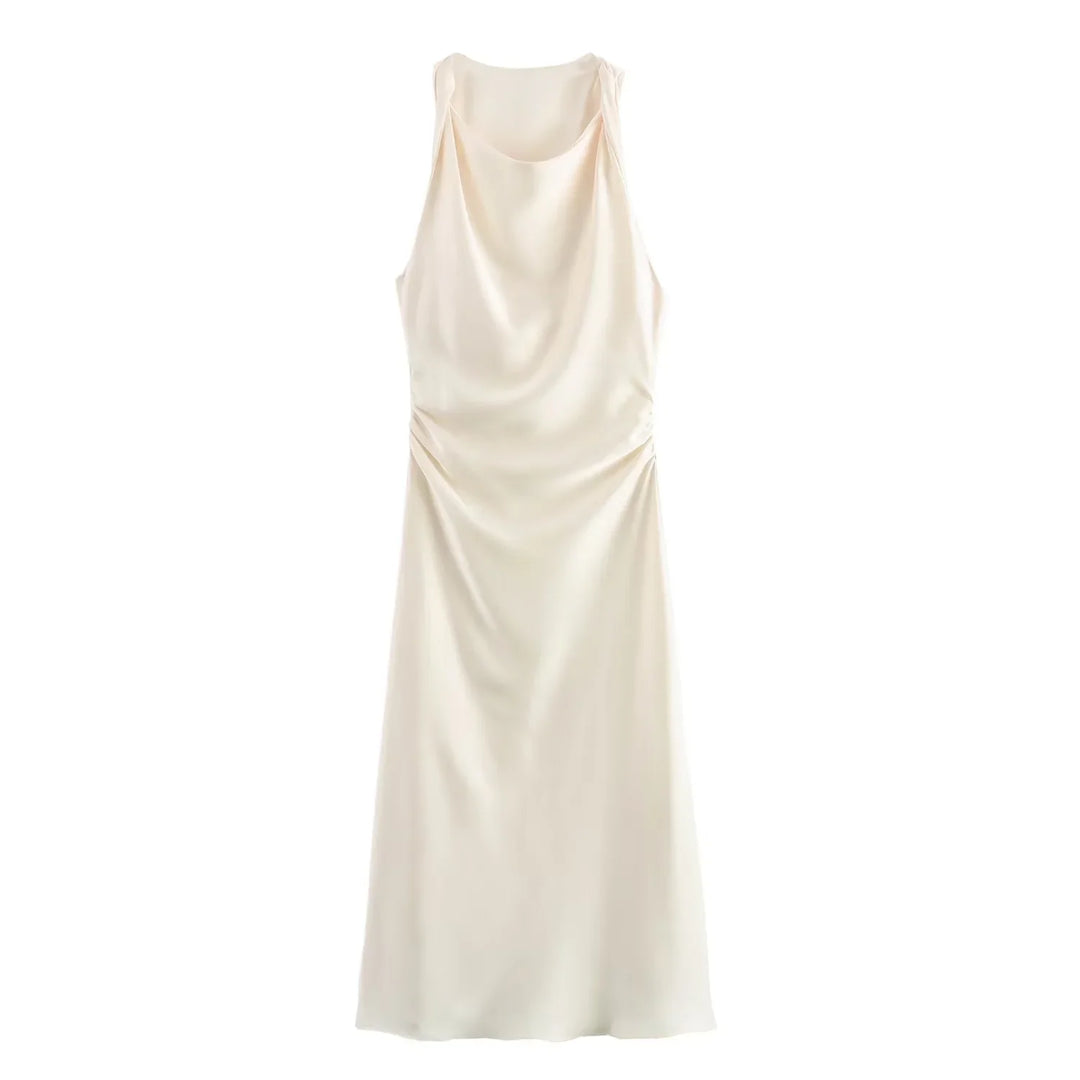 White elegant midi dress showcasing chic styling and graceful drape