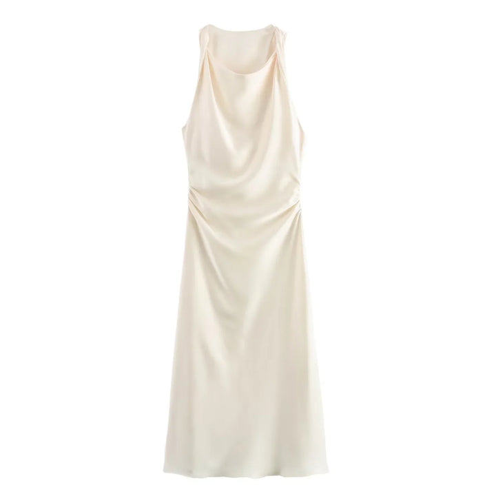 White elegant midi dress showcasing chic styling and graceful drape
