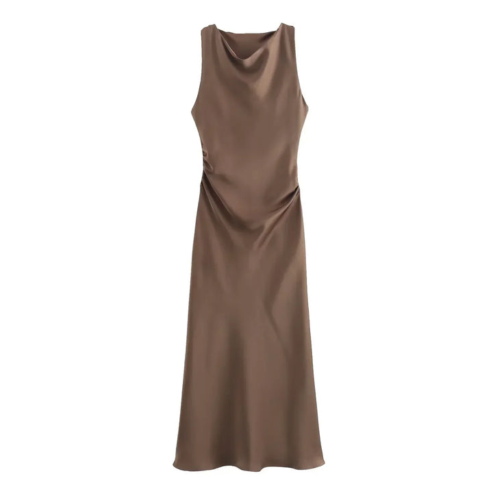 Casual dress style paired with accessories to highlight versatility for daytime wear.