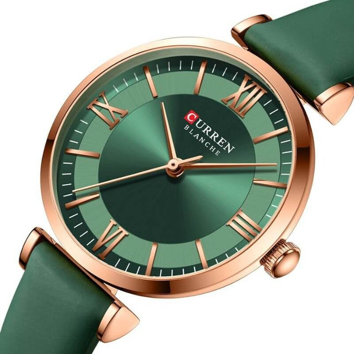Elegant waterproof watch for women displayed flat on a neutral background