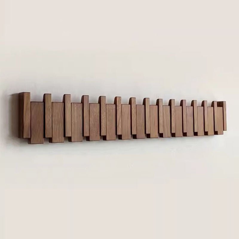 Walnut wooden wall coat rack with folded piano keys design