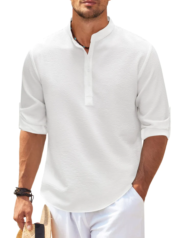 Close-up view of buttons and collar on menswear shirt