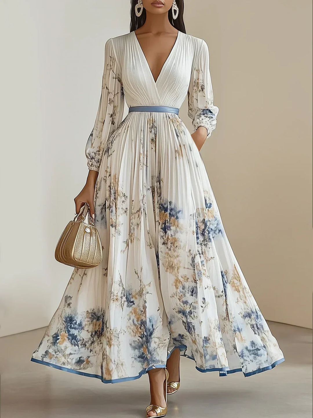 Model wearing white floral V-neck pleated maxi dress with puff sleeves