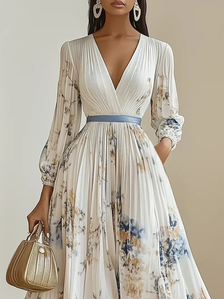 Close-up of the V-neck bodice and contrast waist tie on the floral dress