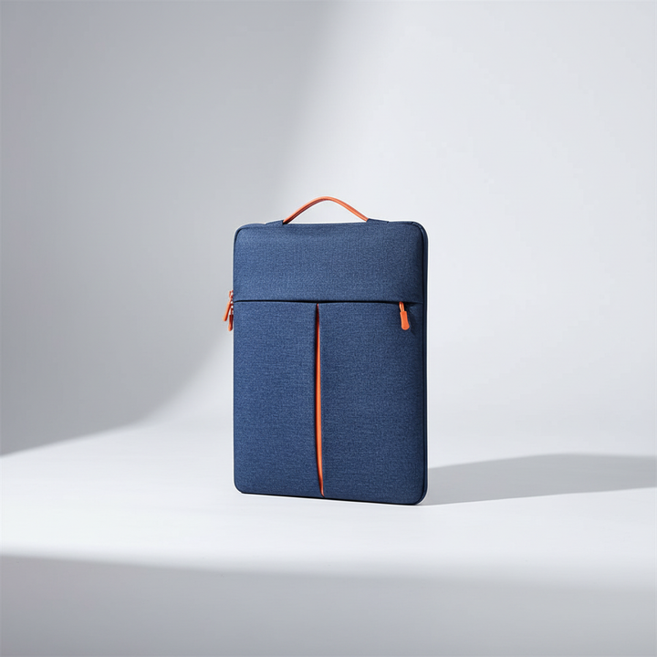 Dark blue unisex protective laptop sleeve resting on a neutral studio background