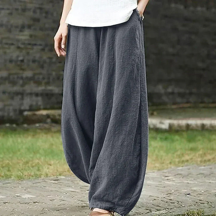 Woman wearing gray wide leg harem pants outdoors