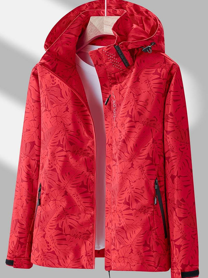 Womens waterproof windproof hooded outdoor jacket in action