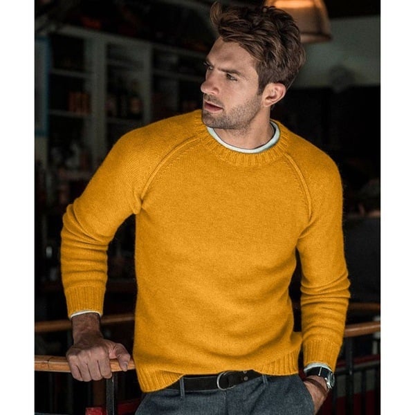 Detailed shot of ribbed hem and cuffs on men fashion sweater