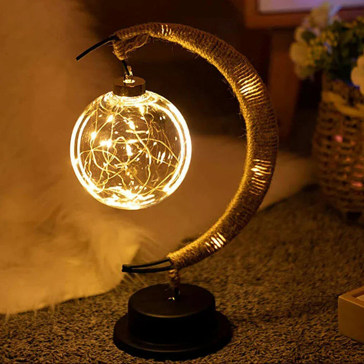 Cordless LED moon lamp glowing softly on a wooden bedside table for bedroom decor