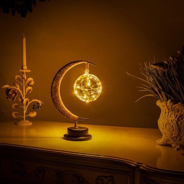 Warm gold ambient moon lamp casting a cozy glow indoors