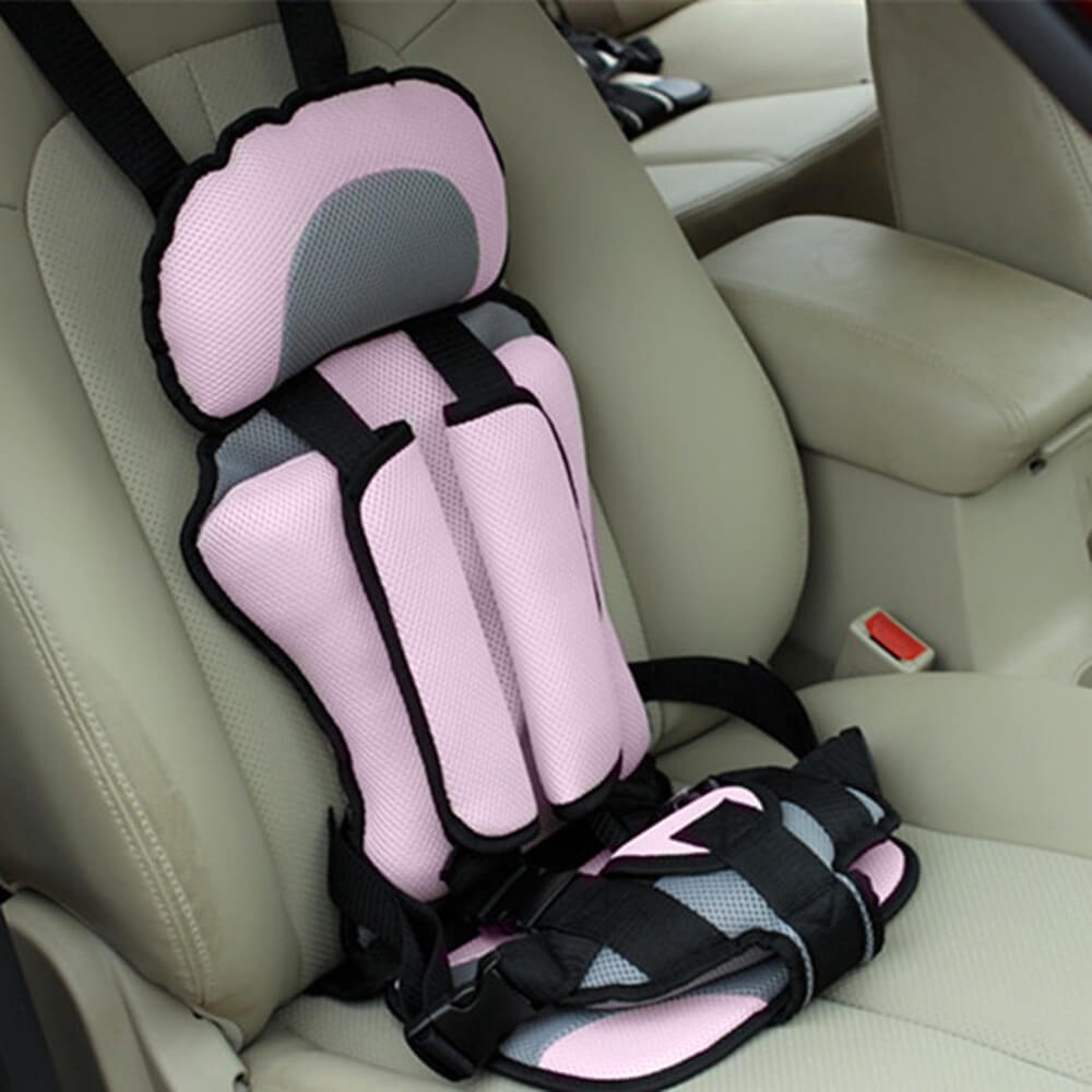 Pink and gray ergonomic baby car seat installed in a vehicle seat