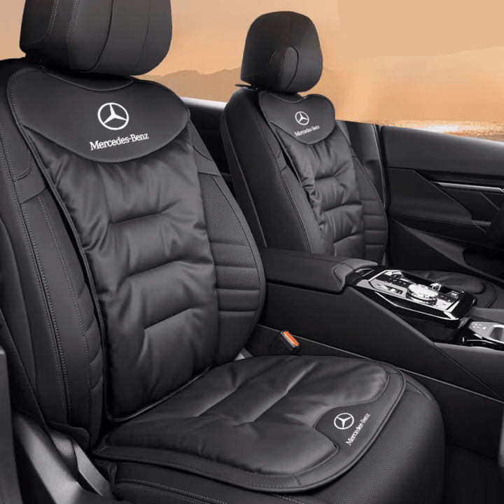 Black car seat cushion featuring a luxury brand logo on the headrest section