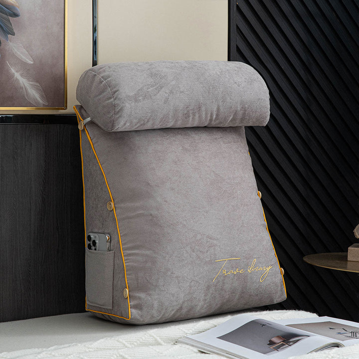 Close-up of side pocket on cozy reading pillow for remote and phone