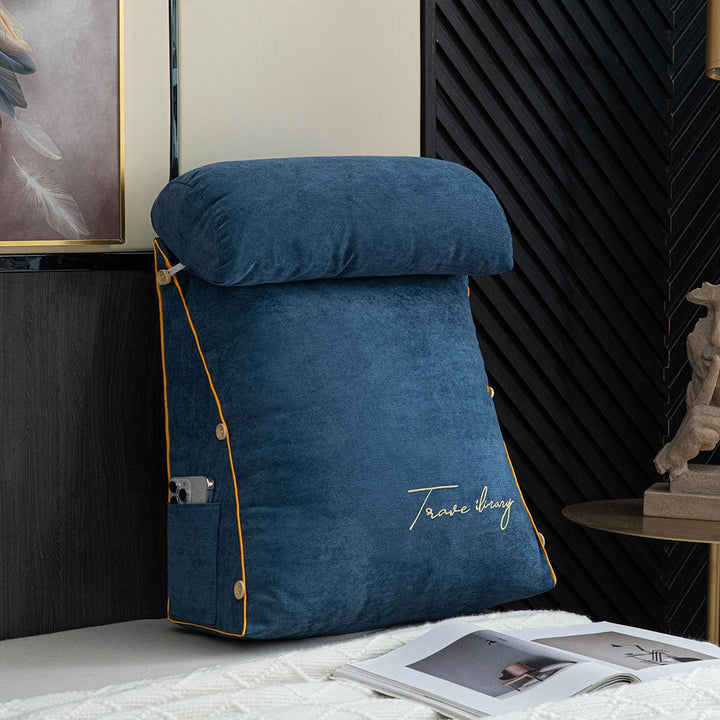 Side view of lounge pillow showing contoured shape for bed reading