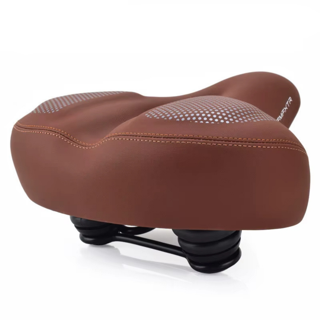 ErgoSoft bicycle saddle in brown color featuring ergonomic curves and dual suspension springs.