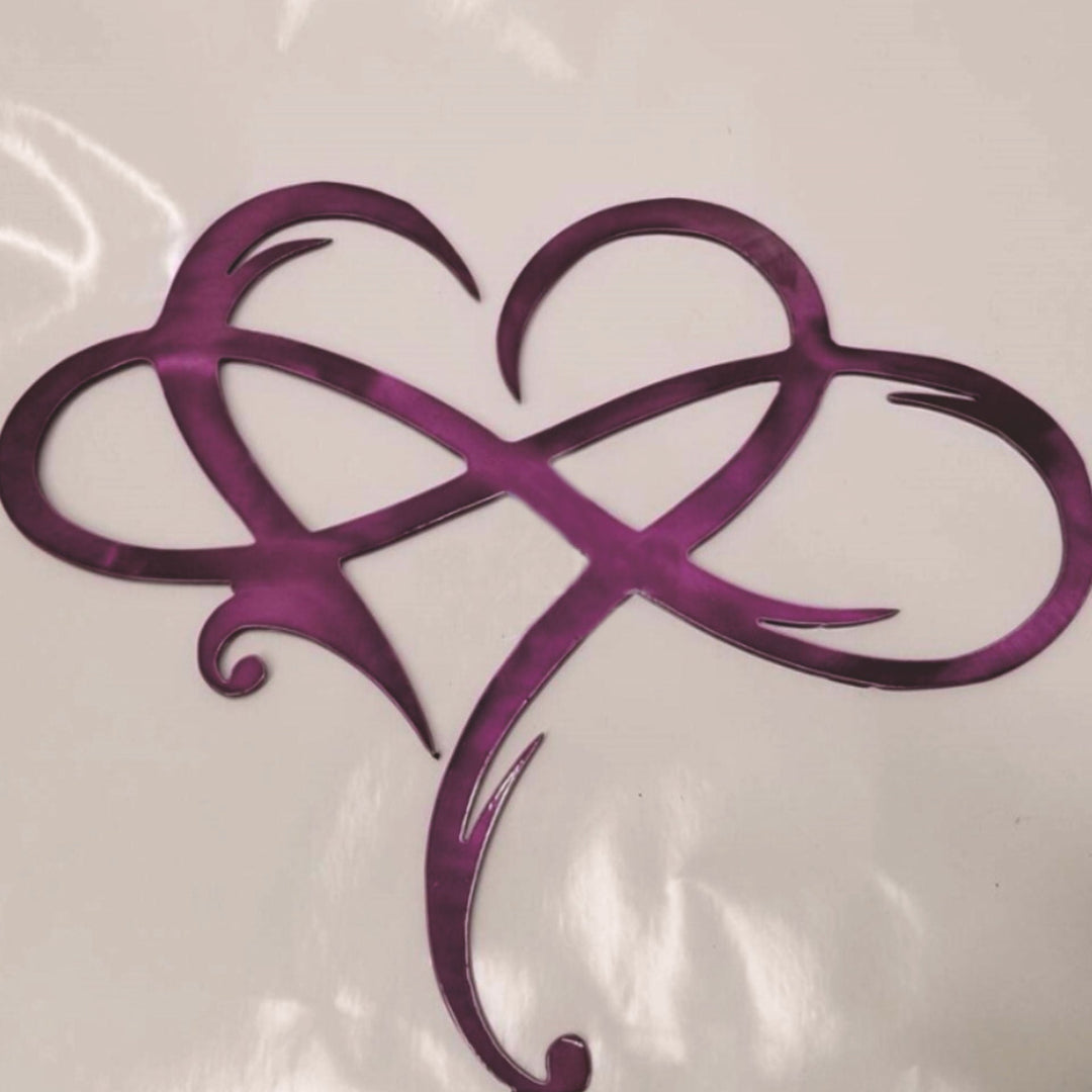 Romantic infinity heart metal wall art hanging in a modern living room
