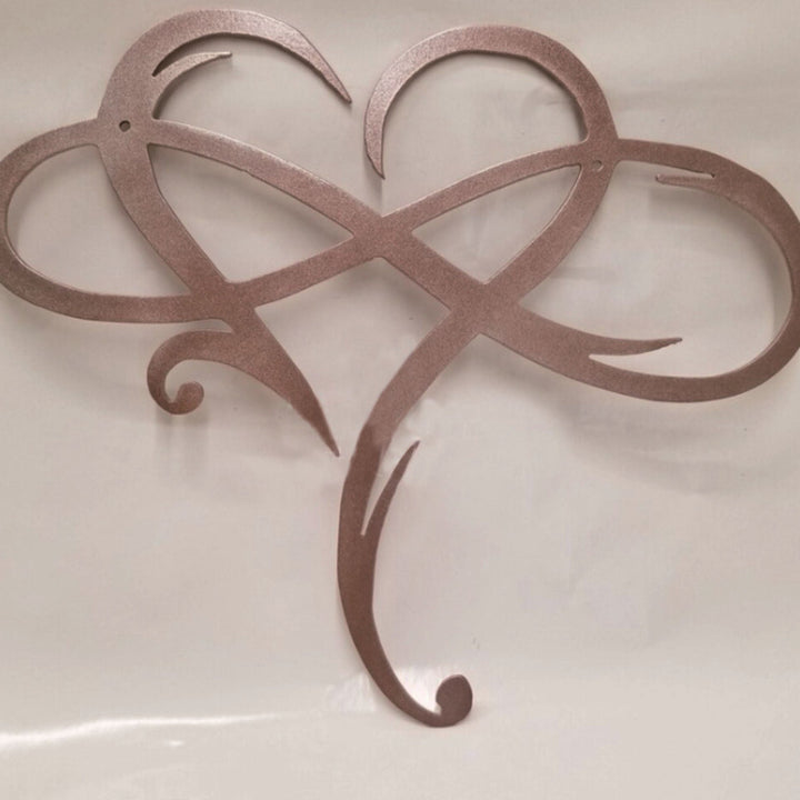 Eternal love metal wall decor piece angled to highlight sleek craftsmanship