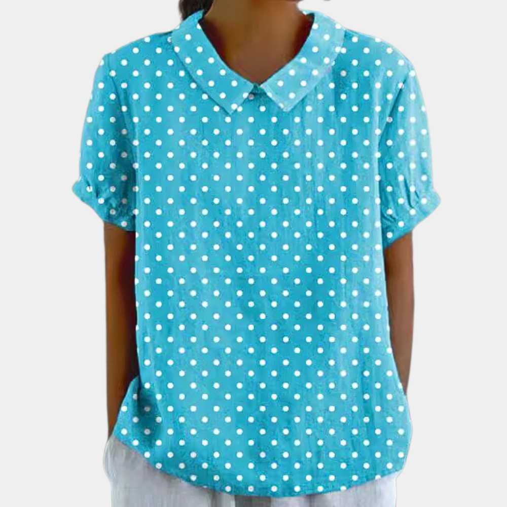 Close-up of women's casual botanical print shirt featuring a Peter Pan collar