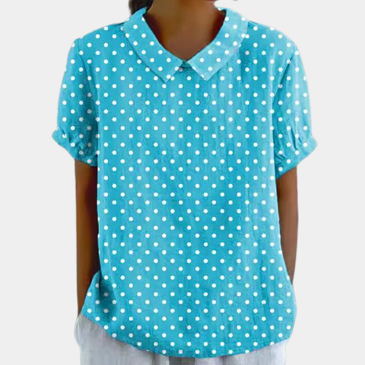 Close-up of women's casual botanical print shirt featuring a Peter Pan collar
