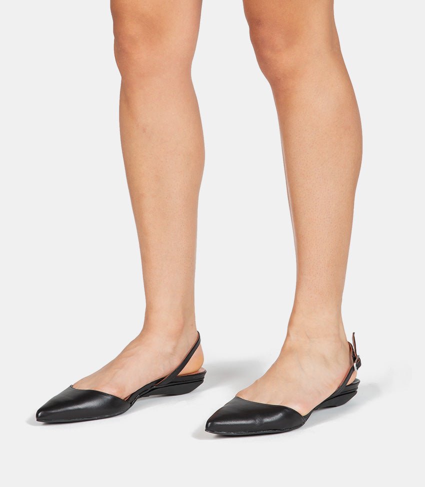 Sole and heel detail of versatile black evening shoes for women