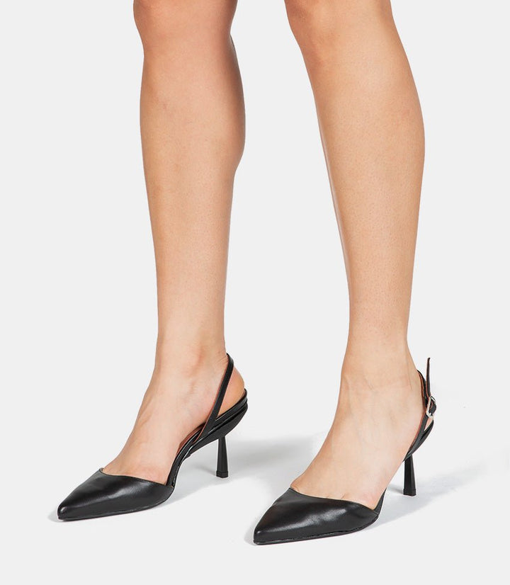 Side profile of women's black everyday block heel shoes showing arch support
