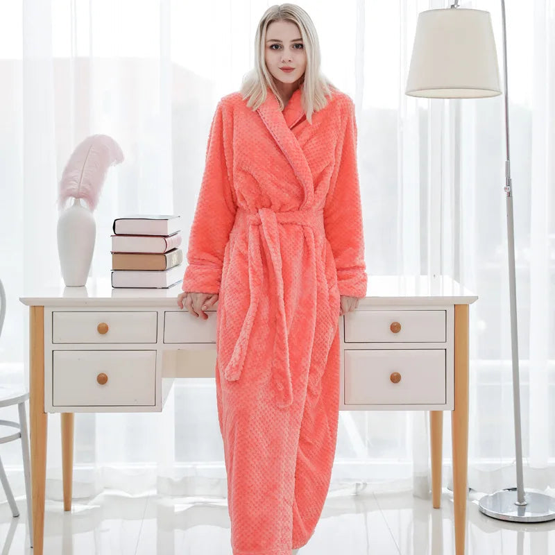 Woman modeling orange plush long bathrobe with belt