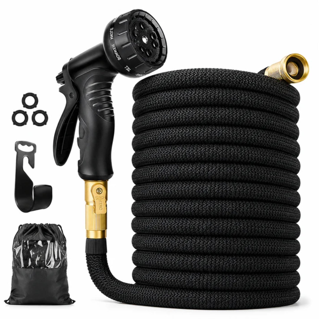 Expandable black garden hose coiled neatly with spray nozzle and accessories