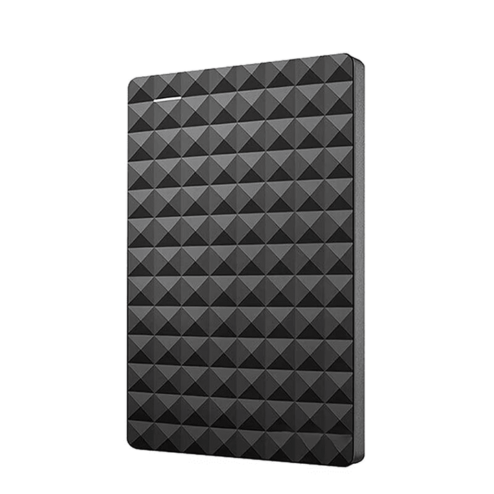External hard drive connected to a modern laptop for file transfer