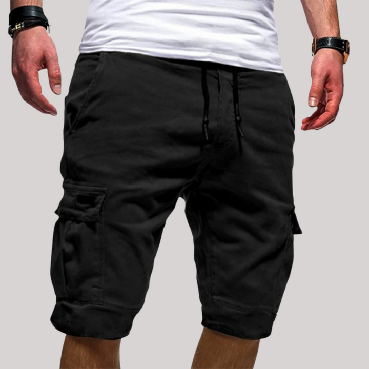 Men wearing black cargo shorts with adjustable drawstring