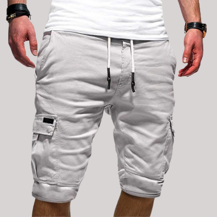 Men wearing light gray cargo knee-length drawstring shorts