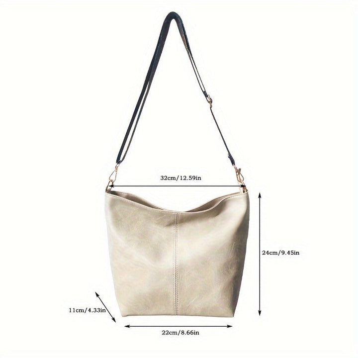 Bottom base view showing the sturdy construction of the geometric bag
