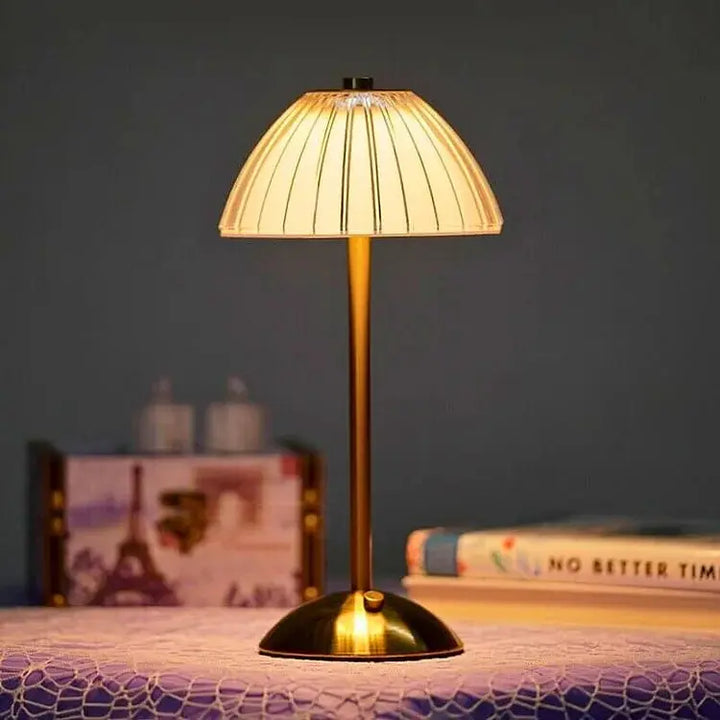 Rechargeable LED desk lamp angled view highlighting sleek metal finish and modern design.