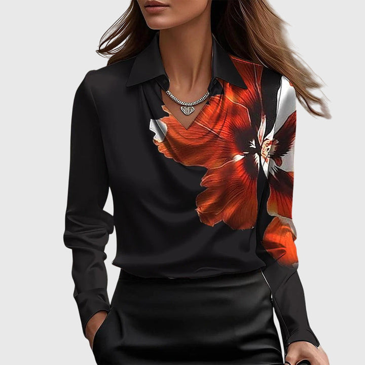 Close-up of elegant shirt collar and pleated detail on women's fashion blouse