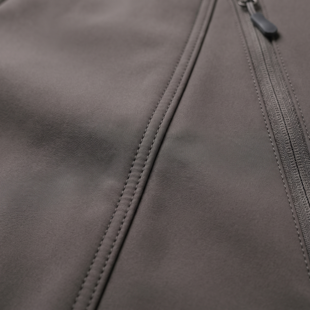 Close-up of waterproof jacket fabric texture and zipper detail