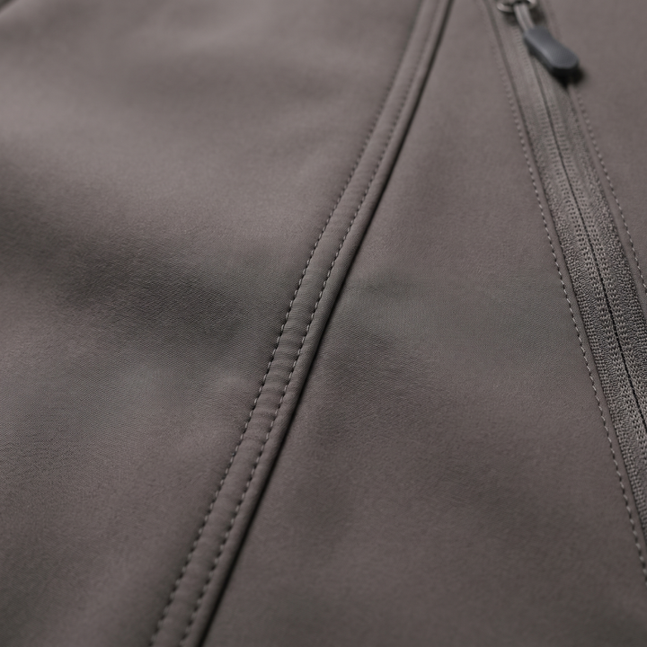 Close-up of waterproof jacket fabric texture and zipper detail