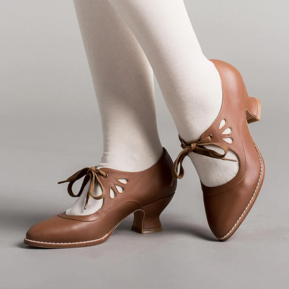 Front angle of stylish women's low heels combining professional fashion with orthopedic comfort.