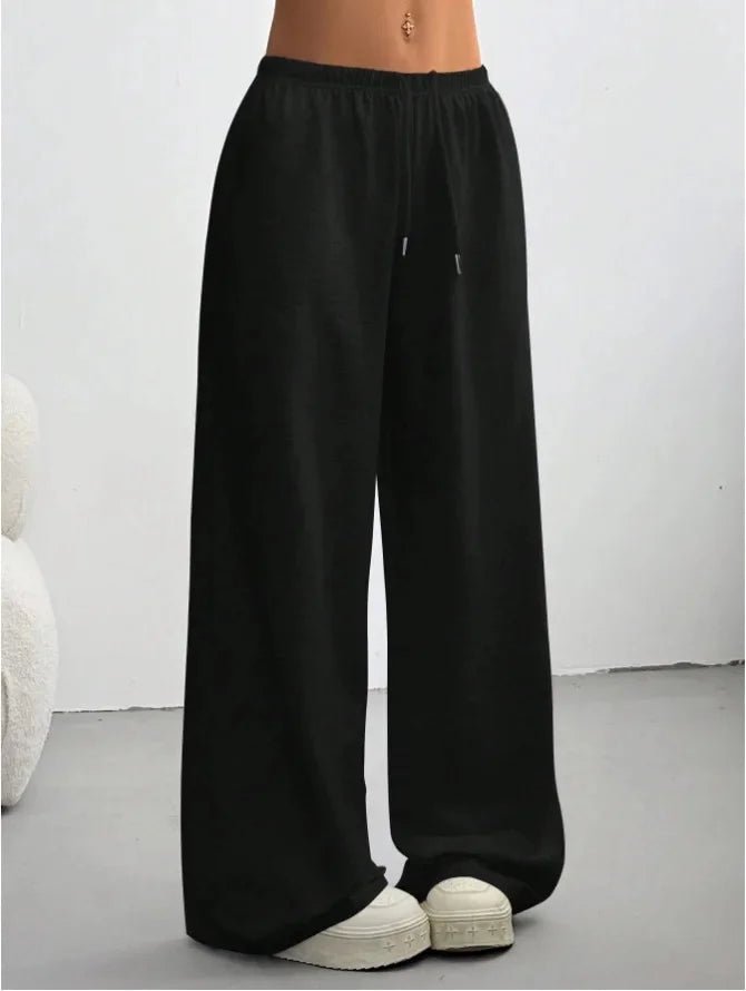 Detail shot of the soft fabric and waistband on women's casual wide-leg joggers.