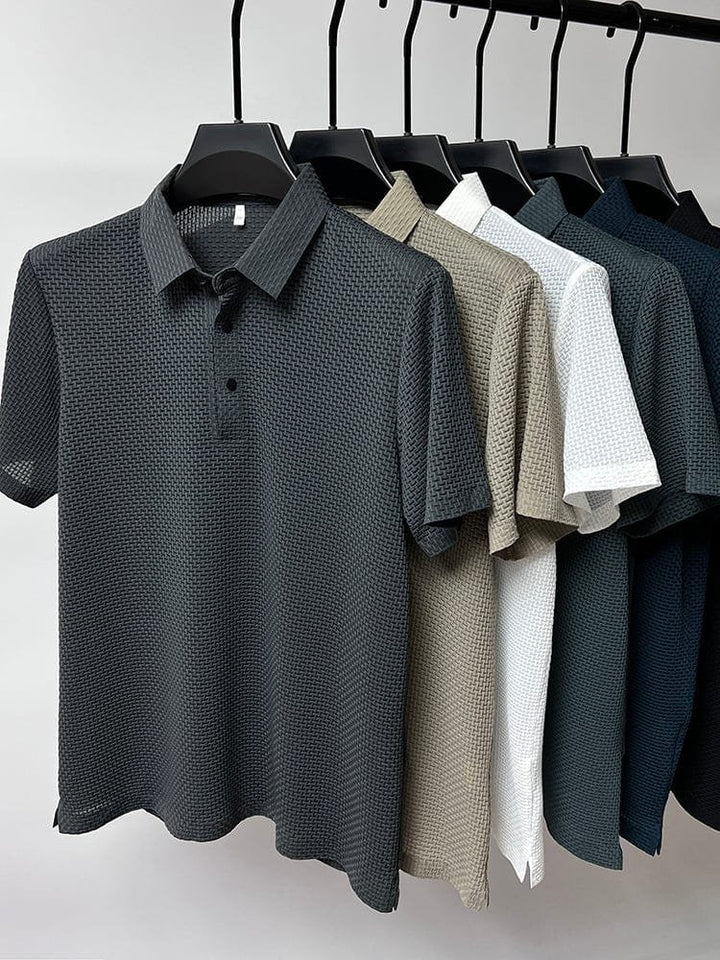 Close-up of sleeve hem and stitching on men's polo